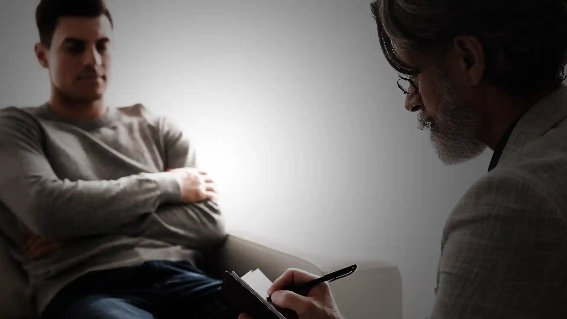 Man på Helix pratar med sin psykolog